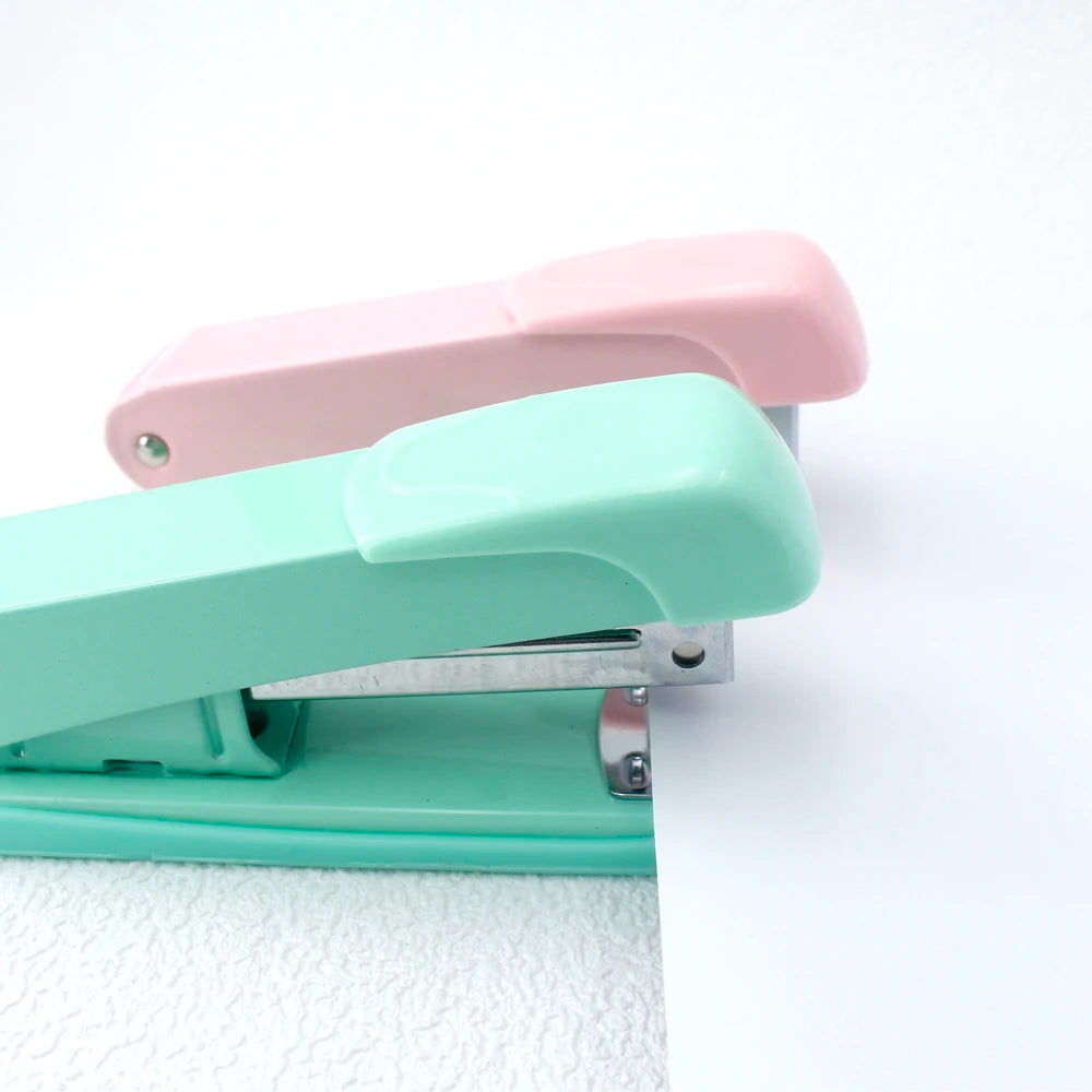 Stapler, staple remover, and staple set - a handy and stylish desktop stapler, perfect for home office use.