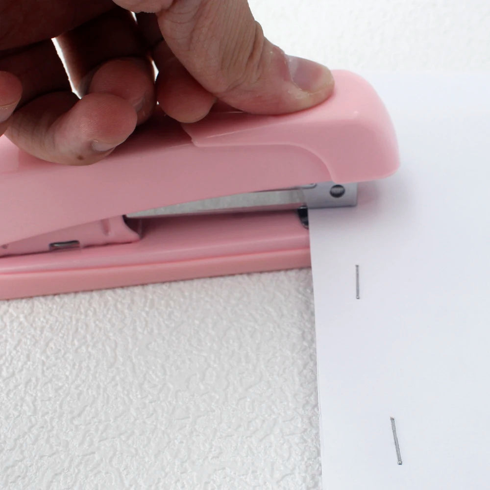 Stapler, staple remover, and staple set - a handy and stylish desktop stapler, perfect for home office use.